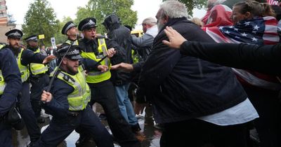 Nine arrests made with more to follow after police attacked at Tommy Robinson rally