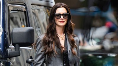 Anne Hathaway just proved that cowboy boots are the chicest shoe trend to pair with tailoring this season