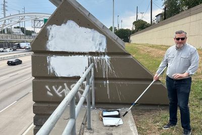 Ted Cruz paints over anti-Charlie Kirk graffiti on Texas freeway
