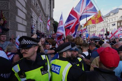 Police launch search for 11 violent disorder suspects linked to Tommy Robinson rally