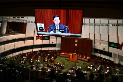 Hong Kong Leader Unveils Plan To Boost Growth With Border Mega-project, AI Push