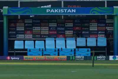 Pakistan's handshake dispute with India delays start of its Asia Cup cricket game against UAE