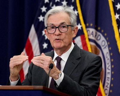 Federal Reserve cuts interest rates by a quarter point, for first time in nearly a year – as it happened