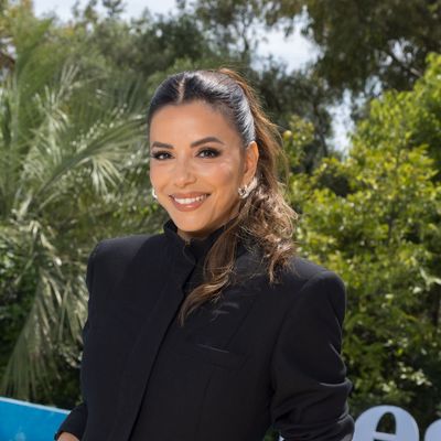 Eva Longoria’s Pouf Ponytail Adds Some Playful Energy to Her Monochromatic Suit