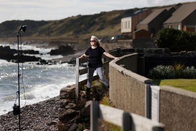 ‘It’s not just our houses’: can a Scottish village save Queen Elizabeth’s coastal path from the waves?