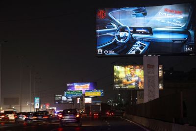 Egypt’s roads face a new hazard. Flashing billboards and adverts