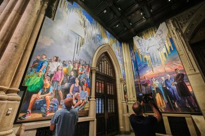 A massive mural honoring NYC immigrants now fills the entrance to St. Patrick’s Cathedral