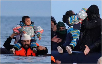 Toddler is passed onto Channel dinghy as hundreds more migrants risk lives to reach UK despite 'one in, one out' deportations