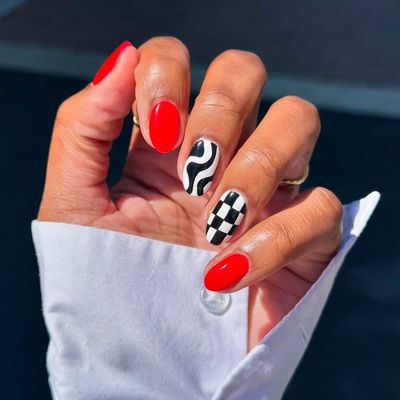 17 Red Nail Designs That Have Me Doubling Down on Fall's Fiery Little Nail Trend