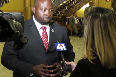 Kansas deputy charged with murder in the death of a man in custody