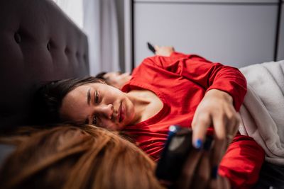 70% of Gen Z are so anxious about money that they can’t sleep—they’re dealing with it by bed rotting and watching TV instead of budgeting