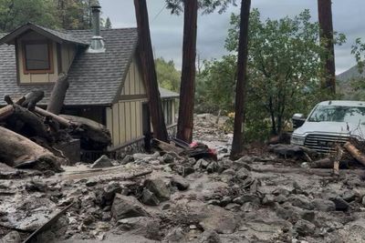 Mudslides trap drivers, bury roads and damage homes in southern California