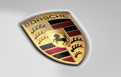 Porsche Slows Electric Shift, Prompting VW Profit Warning