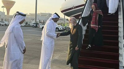 British couple released by the Taliban after months in jail touch down in Doha