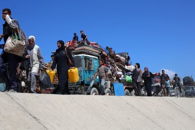 Israel’s intensifying attacks on Gaza kill at least 51 and send thousands fleeing