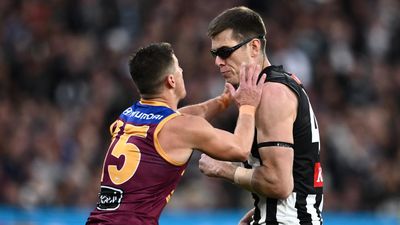 Lions star fined by AFL for targeting Cox's goggles