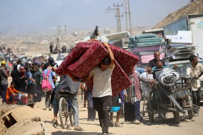 Stalked by bombs and gunfire, Palestinians flee Gaza City on the ‘road of death’