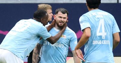 Oliver Burke praised for making Scottish hat-trick history in the Bundesliga