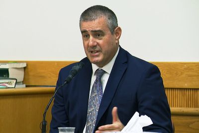 Rhode Island high school coach who did naked fat tests sentenced to year of probation