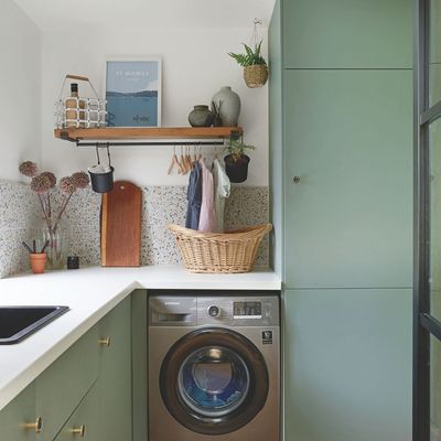 I’ve found the best way to clean underneath (and behind) appliances without moving them – all you need is a wire hanger and a sock
