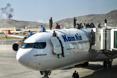 Teenage boy miraculously survives 90-minute flight hiding in plane’s landing gear