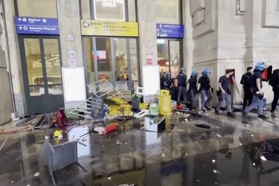 Pro-Palestine protesters smash Milan train station entrance and hurl rocks at police in Gaza fury