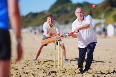 Ed Davey plays cricket at the beach on last day of Lib Dem party conference