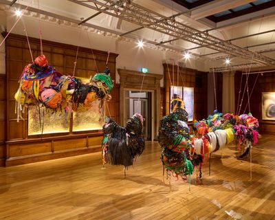 Turner prize 2025 review – puzzling banners, tinkling bells, burning landscapes and bum-like sculptures