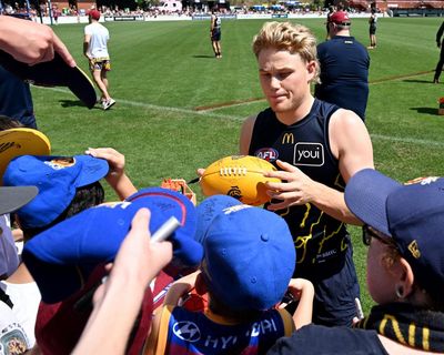 Superstitions make way for AFL grand final traditions as Lions fans get used to success