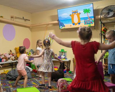 ‘Children thrive down here’: the secret play centre hidden under Ukraine’s most dangerous city