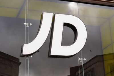 JD Sports says consumer finances ‘strained’ as sales and profits drop