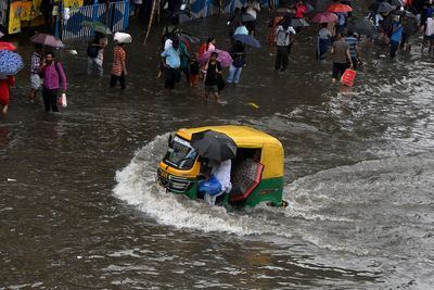 At least 10 dead after eastern Indian city and its suburbs receive heaviest rainfall in nearly 40 years