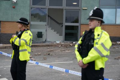 Police dog team pelted with fireworks by rioters recalls ‘intense’ and ‘scary’ experience