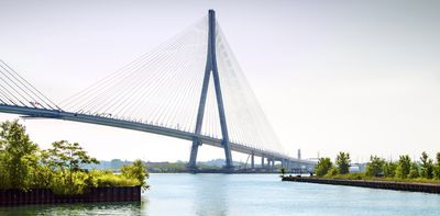 Detroit’s Gordie Howe bridge is poised to open as truck traffic between US-Canada slows – low-income residents are deciding whether to stay or go