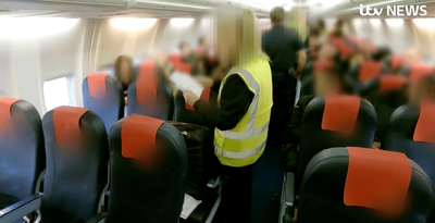 Foreign criminals handed £2,000 cash cards as they're hauled onto deportation flight