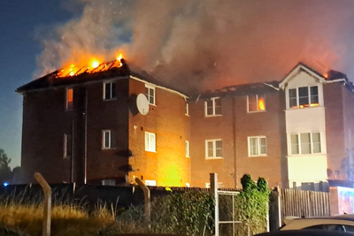 Man charged with arson and attempted murder after Enfield flat fire