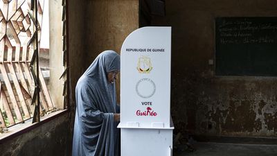 Guinea voters back new constitution clearing path for junta leader