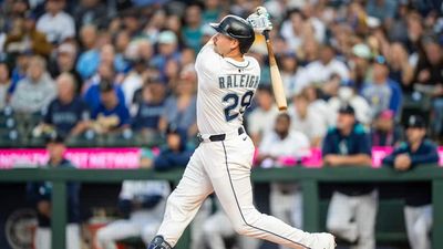 Fan Who Caught Cal Raleigh’s 60th HR Ball Immediately Did Something Awesome With It