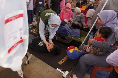 Indonesia’s free school meals programme under scrutiny as 5,000 children fall ill