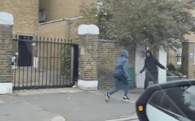 Watch: Horror moment youth 'stabs' group of teenagers during broad daylight knife attack in Brixton