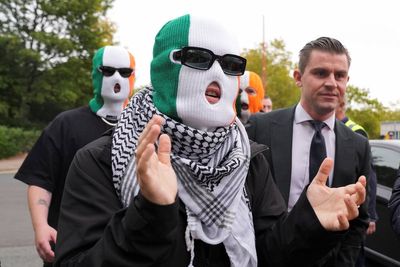 Terror charge against Kneecap band member thrown out by court