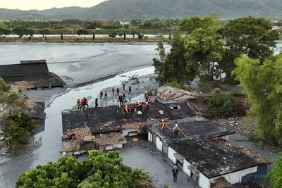 Rescuers wade through mud in Taiwan as Ragasa’s trail of destruction spreads across Asia