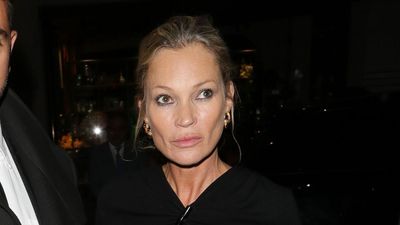 Kate Moss's black maxi dress and knee-high boots combination works effortlessly for cool-weather evenings out