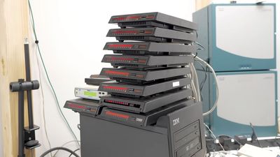 Enthusiasts bond twelve 56K modems together to set dial-up broadband records — a dozen screeching boxes achieve record 668 kbps download speeds