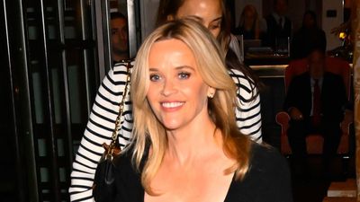 Reese Witherspoon just put her own glamorous stamp on the classic jeans and a nice top combination