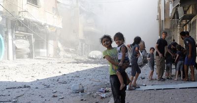 Israeli airstrikes and gunfire kill at least 59 in Gaza