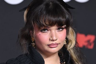 Singer Lola Young says she is ‘doing OK’ after collapsing on stage