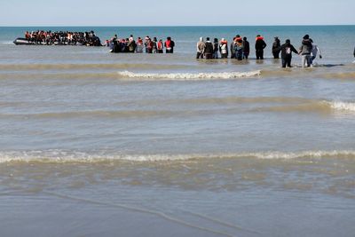 Body of young migrant found on French beach as crossings to UK rise