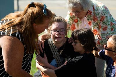 Photos show aftermath of a shooting and fire at a Michigan church