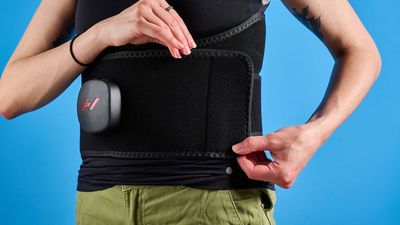 I sit hunched over a desk all day and my back pays the price — here’s how I use the Hyperice Venom 2 Back to ease the pain